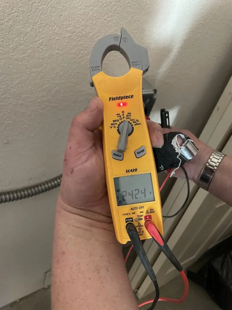 Voltage testing with clamp meter during Circuit Breaker Repair in Marshall